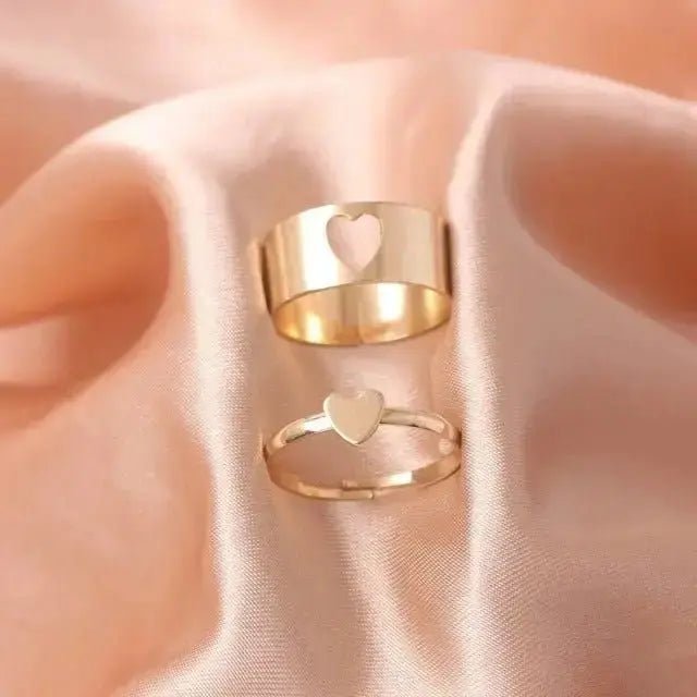 Elegant gold butterfly rings for women featuring heart designs in a delicate layout