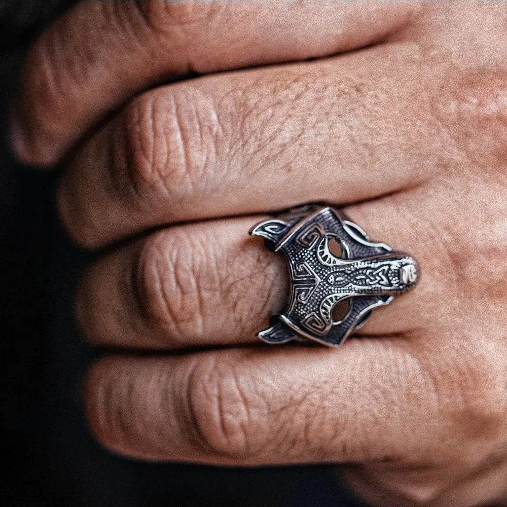 Men's Viking ring featuring intricate wolf design, crafted in antique silver for a bold statement