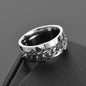 Stylish silver roman numeral spinner ring with a unique chain design for modern fashion enthusiasts